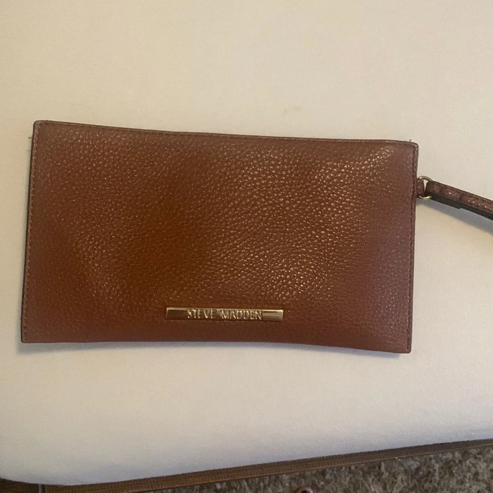 Brown Steve Madden wristlet with handle gold logo